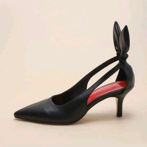 Black Cutout Bow Pumps
